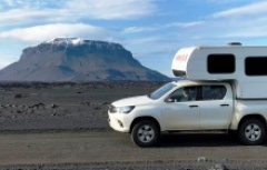Camper van near a volcano in Iceland